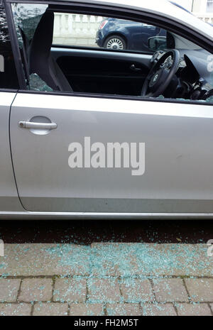 Smashed side window of parked car in South London Stock Photo