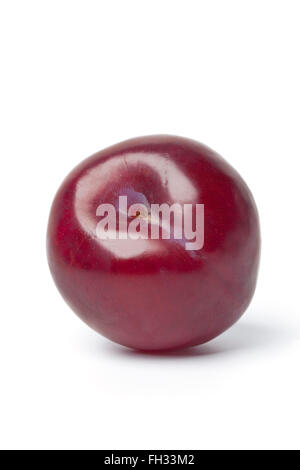 Whole single purple plum isolated on white background Stock Photo