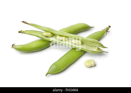 Fresh green Broad beans in pod on white background Stock Photo
