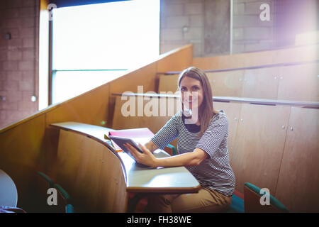 Mature student in lecture hall Stock Photo