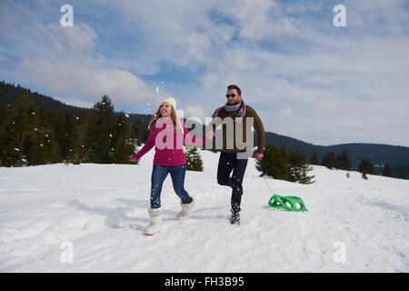 happy young couple having fun on fresh show on winter vacation Stock Photo
