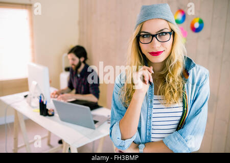 Pretty blonde smiling at camera Stock Photo