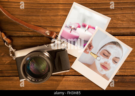 Composite image of lighted candles and petals Stock Photo