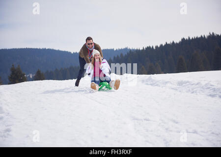 happy young couple having fun on fresh show on winter vacation Stock Photo