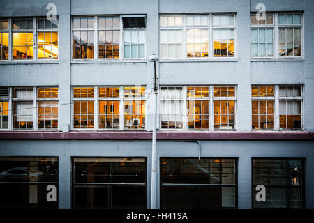 Old Facade of a building with windows, Seattle, Washington State Stock Photo