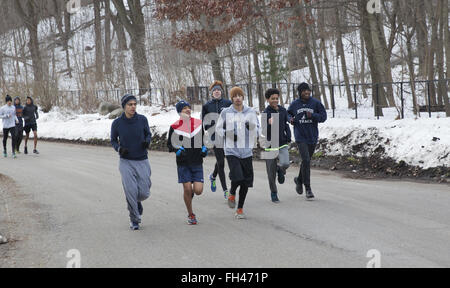 High school track runners working out in Prospect Park in winter, Brooklyn, NY. Stock Photo