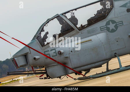 An AH-1W Super Cobra rests on the flight line aboard Marine Corps Air Station Beaufort, Feb. 22. Squadrons from Marine Corps Air Station Cherry Point will visit MCAS Beaufort to participate in Exercise Eager Response Feb. 24-28. Eager Response is a Battalion sized tactical insertion and combined arms exercise with units from 2nd Marine Aircraft Wing from MCAS Cherry Point, N.C. and 2nd Marine Division from Marine Corps Base Camp Lejeune, N.C. The exercise will be conducted at Fort Stewart, Georgia. F/A-18C Hornets from MCAS Beaufort will also participate in the exercise providing close air sup Stock Photo