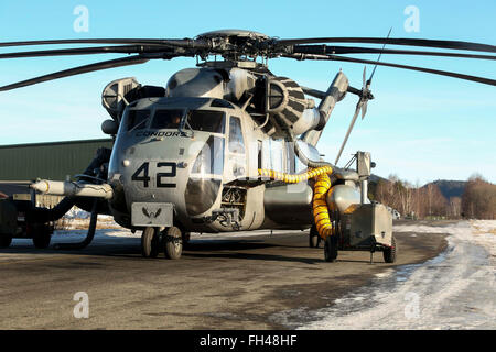 A U.S. Marine Corps CH-53 Super Stallion Helicopter sits connected to warming vents as it prepares for flight later in the day in Vaernes, Norway, Feb. 22, 2016. All aircraft with Marine Heavy Helicopter Squadron (-) Reinforced, the Air Combat Element of 2d MEB, were dismantled at Marine Corps Air Station Cherry Point, N.C., and flown to Norway in U.S. Air Force C-5 Galaxies to provide air support during the exercise. Cold Response 16 is a combined, joint exercise comprised of 12 NATO allies and partnered nations and approximately 16,000 troops