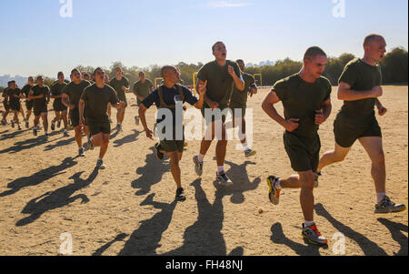 Recruits of Kilo Company, 3rd Recruit Training Battalion, conduct sprint drills during a physical training session at Marine Corps Recruit Depot San Diego, Feb. 22. If the recruits moved slowly, drill instructors motivated them to move faster and to get the most out of the session. Annually, more than 17,000 males recruited from the Western Recruiting Region are trained at MCRD San Diego. Kilo Company is scheduled to graduate May 6. Stock Photo