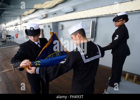 Italy ( Feb. 22, 2016) Sailors aboard the U.S. 6th Fleet command and control ship USS Mount Whitney (LCC 20) secure the command pennant after the flagship departed Gaeta, Italy, Feb. 22, 2016. Mount Whitney, the U.S. 6th Fleet command and control ship, forward deployed to Gaeta, Italy, is conducting naval operations in the U.S. 6th Fleet area of operations in support  of U.S. National security interests in Europe. Stock Photo