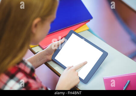 Blonde student using tablet during class Stock Photo