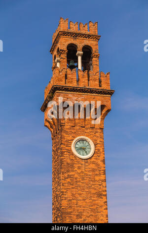 A closeup to a Bell and Clock Tower in Campo Santo Stefano, Murano during the day. Stock Photo