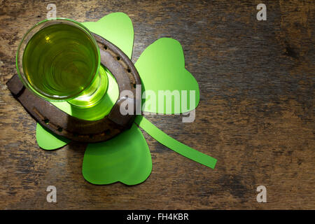 St. Patrick's Day green beer and horseshoe abstract background Stock Photo