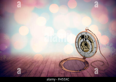 Composite image of retro styled pocket clock with chain Stock Photo