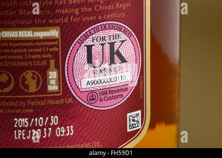 Close up of the UK HM Revenue and Customs Excise Duty seal on a bottle of whisky Stock Photo