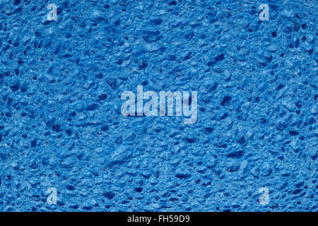 Close up detail of a blue coloured artificial sponge Stock Photo