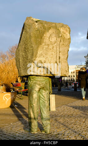Sculpture "Unknown Bureaucrat" sculpture shows man in suit holding briefcase with head and shoulders Reykjavik Iceland Stock Photo