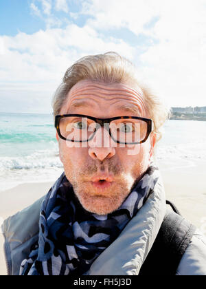 Portrait of Senior Man Outdoors making a Face, Spain Stock Photo