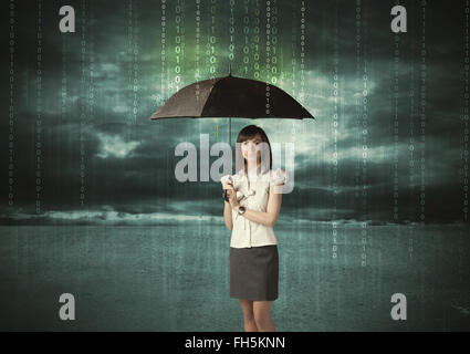 Business woman standing with umbrella data protection concept Stock Photo