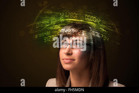 Business woman looking at high tech number calculations Stock Photo