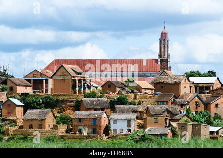 Church and village in the high land Madagascar with dramatic sky Stock Photo