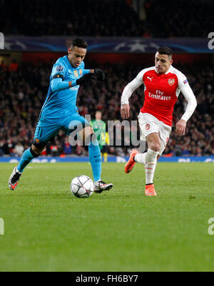 London, UK. 23rd Feb, 2016. Neymar (L) of Barcelona breaks through during the UEFA Champions League Round of 16 1st Leg match between Arsenal and Barcelona at the Emirates Stadium in London, England on Feb. 23, 2016. Arsenal lost 0-2. © Han Yan/Xinhua/Alamy Live News Stock Photo