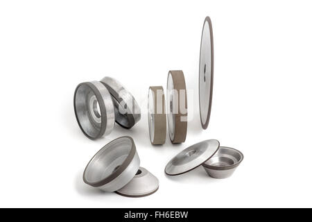 Various diamond wheels photographed in the studio on white background.  Conical and flaring cup grinding wheels. Stock Photo