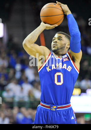 Kansas Guard Frank Mason Iii (0) Moves The Ball Against Tcu Guard Kyan 