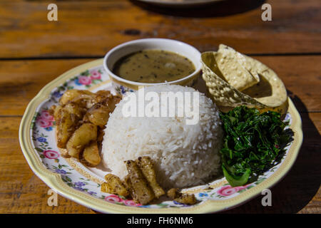 The traditional Nepalese dish Dal Bhat, which most Nepalese people eat twice a day. Stock Photo