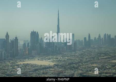 Photograph of Dubai skyline with the famous Burj Khalifa taken from a seaplane. Stock Photo