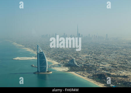 Dubai, United Arab Emirates - October 17, 2014: Photograph of the famous Burj Al Arab hotel in Dubai taken from a seaplane. Stock Photo