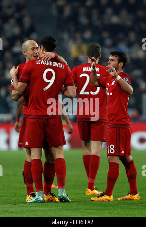 Bayern’s Arjen Robben, left, celebrates with teammates after scoring during the Champions League first leg round of 16 football match between Juventus and Bayern at the Juventus Stadium. The game ended 2-2. (Photo by Riccardo de Luca / Pacific Press) Stock Photo