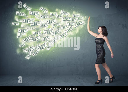 Business person throwing a lot of dollar bills concept Stock Photo