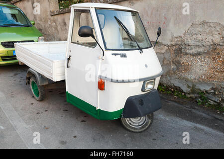 Fermo, Italy - February 8, 2016:  White Ape TM P 50 a three-wheeled light commercial vehicle produced since 1948 by Stock Photo