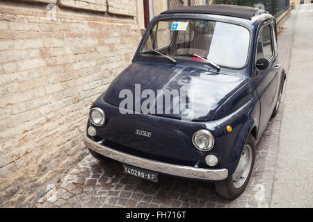 Fermo, Italy - February 11, 2016: Old Fiat Nuova 500 city car produced by the Italian manufacturer Fiat between 1957 and 1975 Stock Photo