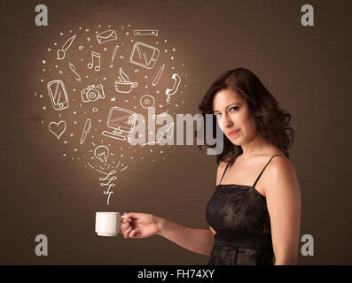 Businesswoman holding a white cup with social media icons Stock Photo