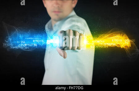 Man holding colorful glowing data in his hands Stock Photo
