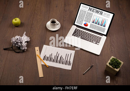Computer laptop on desk with office accessories Stock Photo