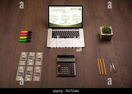 Business table with notebook computer and office accessories Stock Photo