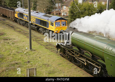 York, UK, 24 February 2016. Newly restored LNER A3 class locomotive “Flying Scotsman” leaves York on its way to London to make its inaugural comeback passenger-hauling journey from London King's Cross to York the following day. The locomotive has been restored at a cost of £4.2 million and in addition to featuring in a new exhibition at the NRM's York location will be hauling special trains throughout the UK in the coming months. Credit:  david soulsby/Alamy Live News Stock Photo