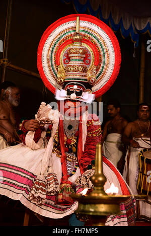 Kathakali is a stylized classical Indian dance-drama noted for the attractive make-up of characters, elaborate costumes, detaile Stock Photo