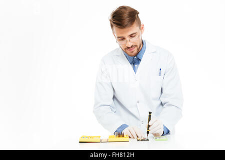 Engineer repair smartphone isolated on a white backgorund Stock Photo