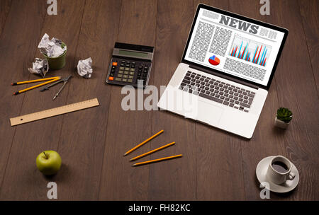Computer laptop on desk with office accessories Stock Photo