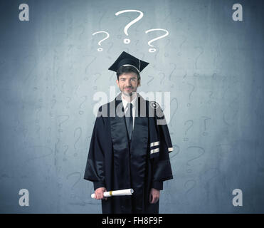 Young graduate teenager with question marks drawn Stock Photo - Alamy