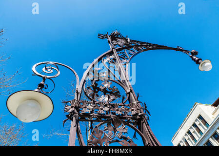 Modernist style streetlight, built in 1906 and recently restored on the Passeig de Gracia, Barcelona, Catalonia, Spain