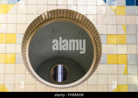 circles on the wall in the Lisbon subway forming abstract shapes in Portugal Stock Photo