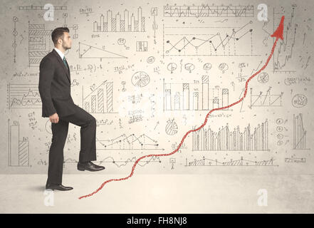 Business man climbing on red graph arrow concept Stock Photo - Alamy