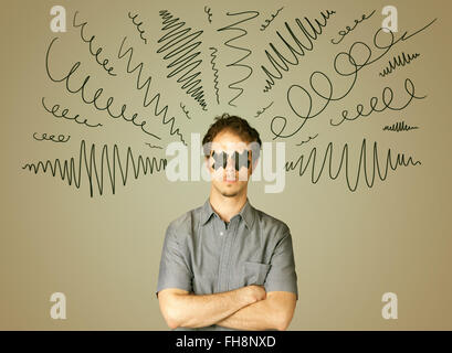 Young man with glued eye and curly lines Stock Photo