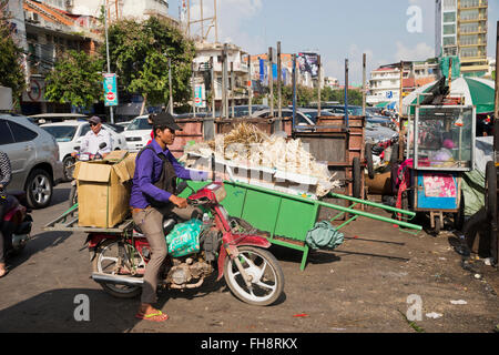 busy street with motorbike in Phnom Penh, Cambodia Stock Photo