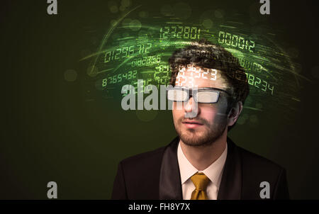 Business man looking at high tech number calculations Stock Photo